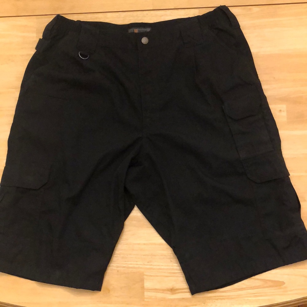 Men’s cargo style shorts 24” in length, 36” waist.